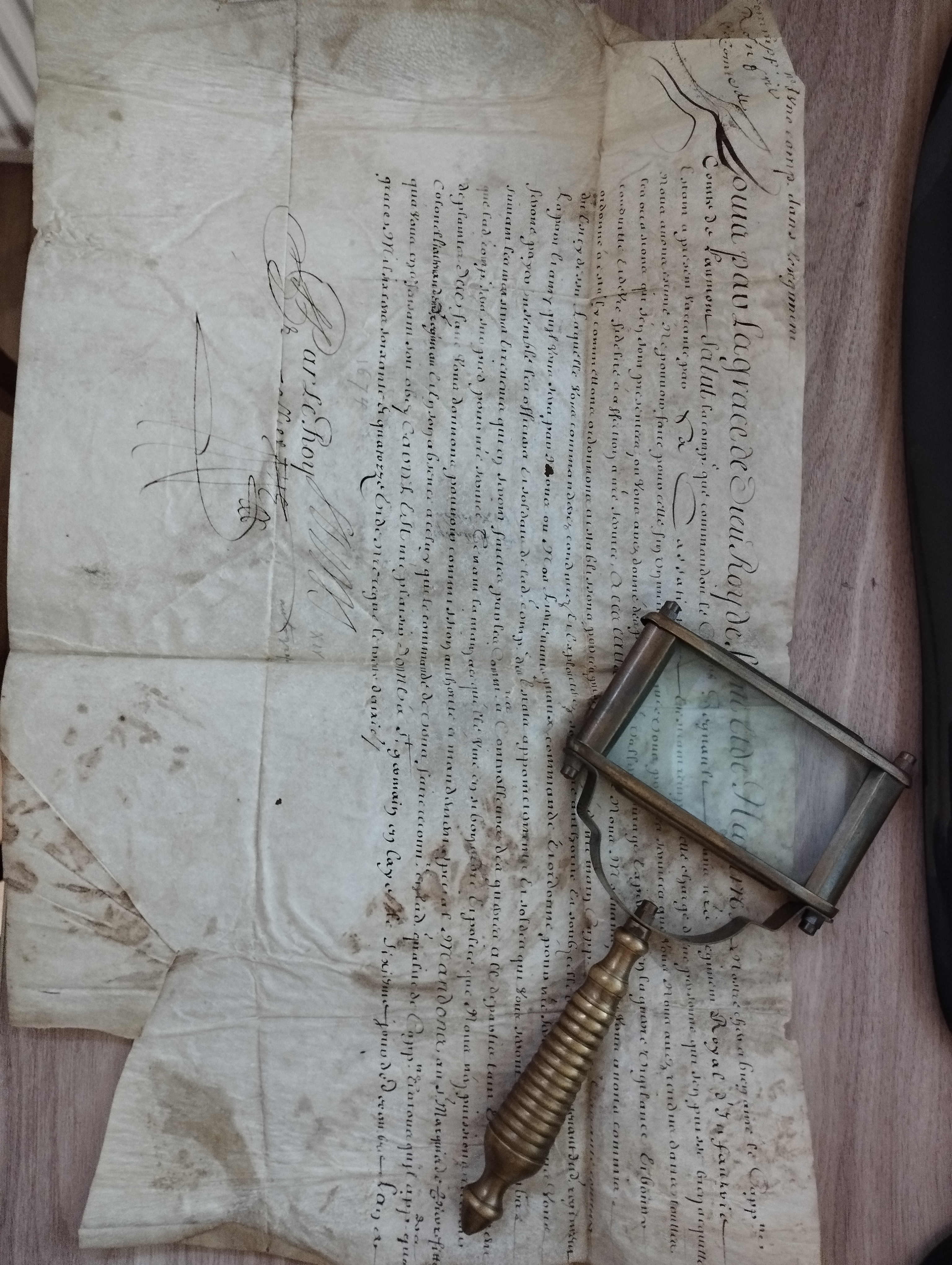 LOUIS XIV. Pièce signée (secrétaire) sur parchemin, 6 décembre 1674